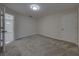 Clean bedroom is carpeted with neutral walls and white trim at 1415 Southern Ave, Lakeland, FL 33803