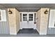 Front entryway with double doors and brick pillars at 1628 Lakewood S Dr, Lakeland, FL 33813