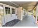Covered front entry with double doors and brick pillars at 1628 Lakewood S Dr, Lakeland, FL 33813