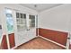 Entry foyer with double doors and tiled floor at 1628 Lakewood S Dr, Lakeland, FL 33813