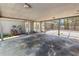 Spacious covered lanai area with access to the backyard and pool at 1628 Lakewood S Dr, Lakeland, FL 33813