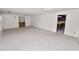 The room offers wall-to-wall carpeting and access to the kitchen at 1628 Lakewood S Dr, Lakeland, FL 33813