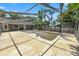 Screened in pool with large deck and ample sunshine at 1628 Lakewood S Dr, Lakeland, FL 33813