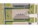 Aerial view of a house showing the roof, the backyard, and a white fence at 1725 Hill Top Dr, Dundee, FL 33838