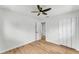 Bright bedroom with hardwood floors and a closet offering functional space at 1728 Bush Ave, Lakeland, FL 33805
