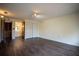Bedroom with vinyl flooring, bright lighting, and a closet for storage at 1920 Indian Trails Ct, Lakeland, FL 33813