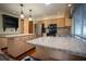 Bright kitchen with stainless steel appliances, an island, and granite countertops at 1920 Indian Trails Ct, Lakeland, FL 33813