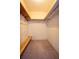 Walk-in closet with built-in shelving, offering ample storage space at 1920 Indian Trails Ct, Lakeland, FL 33813