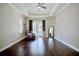 Large bedroom features tray ceilings, hardwood floors, and a relaxing massage chair at 2032 Indian Sky Cir, Lakeland, FL 33813