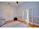 Bright living room with hardwood flooring, a chair and french doors for lots of light at 2032 Indian Sky Cir, Lakeland, FL 33813