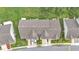 Aerial view of the townhome's roof, manicured lawns, driveways, and neighborhood layout at 2047 Winterset Dr, Lakeland, FL 33813