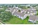 Aerial view of townhomes backing onto a sprawling green space, offering serene views at 2047 Winterset Dr, Lakeland, FL 33813