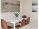 Modern dining table with seating for four and stylish decor at 2047 Winterset Dr, Lakeland, FL 33813