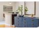 Stylish console table with unique decor items, adjacent to the living area and open to the dining space at 2047 Winterset Dr, Lakeland, FL 33813
