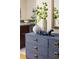 Close-up of the stylish console table adorned with decorative items and adjacent to the living area at 2047 Winterset Dr, Lakeland, FL 33813