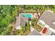Aerial view of the pool and surrounding community, perfect for relaxation and enjoyment at 2047 Winterset Dr, Lakeland, FL 33813