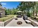 Grilling area with covered grill, perfect for backyard barbecues and outdoor cooking at 2145 Limedale Rd, Lakeland, FL 33809