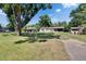 Well-maintained single-Gathering home with a detached garage and spacious front yard at 2145 Limedale Rd, Lakeland, FL 33809