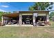 Spacious garage with ample storage and parking space for vehicles and equipment at 2145 Limedale Rd, Lakeland, FL 33809