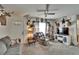 Charming living room with carpet, comfortable seating, front door, and quirky deer decor at 2145 Limedale Rd, Lakeland, FL 33809