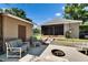 Relaxing outdoor patio with comfortable seating and a charming fire pit, perfect for entertaining at 2145 Limedale Rd, Lakeland, FL 33809
