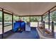 Screened-in porch providing a relaxing outdoor space, perfect for enjoying nature and fresh air at 2145 Limedale Rd, Lakeland, FL 33809