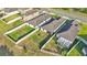 This aerial shot emphasizes the spacious backyards and fences, ideal for outdoor activities and privacy at 2293 Caspian Dr, Lakeland, FL 33805