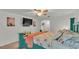 Bright bedroom with a turquoise bed frame, ceiling fan, and decoratively painted with a coastal theme at 2293 Caspian Dr, Lakeland, FL 33805