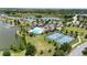 Beautiful community featuring a pool, clubhouse, tennis courts, lake, and lush landscaping at 2293 Caspian Dr, Lakeland, FL 33805