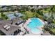 Aerial view of the community pool, tennis courts, clubhouse, and amenity center at 2293 Caspian Dr, Lakeland, FL 33805