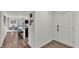 Inviting entryway leading to an open-concept living area with an island and modern finishes at 2293 Caspian Dr, Lakeland, FL 33805