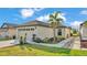 Beautiful single-story home featuring a well-manicured lawn and landscaped garden at 2293 Caspian Dr, Lakeland, FL 33805