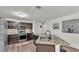 The kitchen features granite counters, stainless steel appliances, and dark cabinets at 2293 Caspian Dr, Lakeland, FL 33805