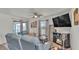 Cozy living room with patio access, contemporary decor and plenty of natural light at 2293 Caspian Dr, Lakeland, FL 33805