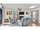 Cozy living room with comfortable seating, a fireplace, and plenty of natural light at 2293 Caspian Dr, Lakeland, FL 33805
