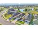Birds-eye view of a serene neighborhood with modern single-Gathering homes and picturesque landscaping at 2293 Caspian Dr, Lakeland, FL 33805