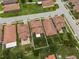 Areal view of property showing roof, trees, street and the well manicured yards at 2317 Bella Luna Cir, Lakeland, FL 33810