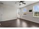 Bedroom featuring ceiling fan and three windows letting in lots of natural light at 2317 Bella Luna Cir, Lakeland, FL 33810