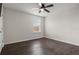 Bedroom with a large window offering natural light, and updated flooring at 2317 Bella Luna Cir, Lakeland, FL 33810