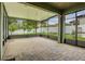 Spacious screened patio with brick pavers is ideal for outdoor entertaining at 2317 Bella Luna Cir, Lakeland, FL 33810