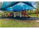 Vibrant playground with slides, climbing walls, and a shaded area for endless fun at 2317 Bella Luna Cir, Lakeland, FL 33810