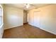 Bedroom featuring tiled flooring, a ceiling fan, closet space, and a window at 2323 Ridgeview Dr, Lakeland, FL 33810
