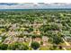 Expansive aerial view of a residential area, showcasing houses and lush landscapes from above at 2710 Fairmount Ave, Lakeland, FL 33803