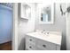 Bathroom featuring a vanity with chrome fixtures, framed mirror, and medicine cabinet at 2710 Fairmount Ave, Lakeland, FL 33803