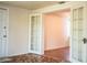 Bright living room with unique tiled flooring and elegant french doors to an adjoining room at 2710 Fairmount Ave, Lakeland, FL 33803
