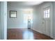 Bright and airy living room featuring beautiful laminate floors and natural light at 2710 Fairmount Ave, Lakeland, FL 33803