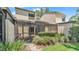 This home has a backyard with beautiful landscaping and a screened patio with views at 30 Aspen Dr # 30, Haines City, FL 33844