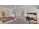 Comfortable bedroom with twin beds, dresser, a desk with chair and a bright window with natural light at 30 Aspen Dr # 30, Haines City, FL 33844