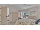 Bright bedroom featuring a sliding glass door to the patio and a closet for storage at 30 Aspen Dr # 30, Haines City, FL 33844