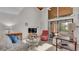Comfortable living room with vaulted ceilings and lots of natural light at 30 Aspen Dr # 30, Haines City, FL 33844